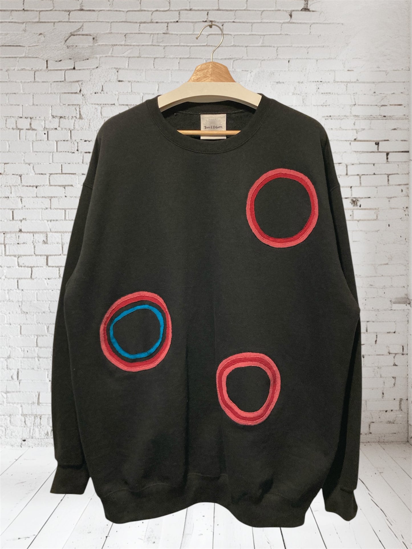 Upcycled sweatshirt.