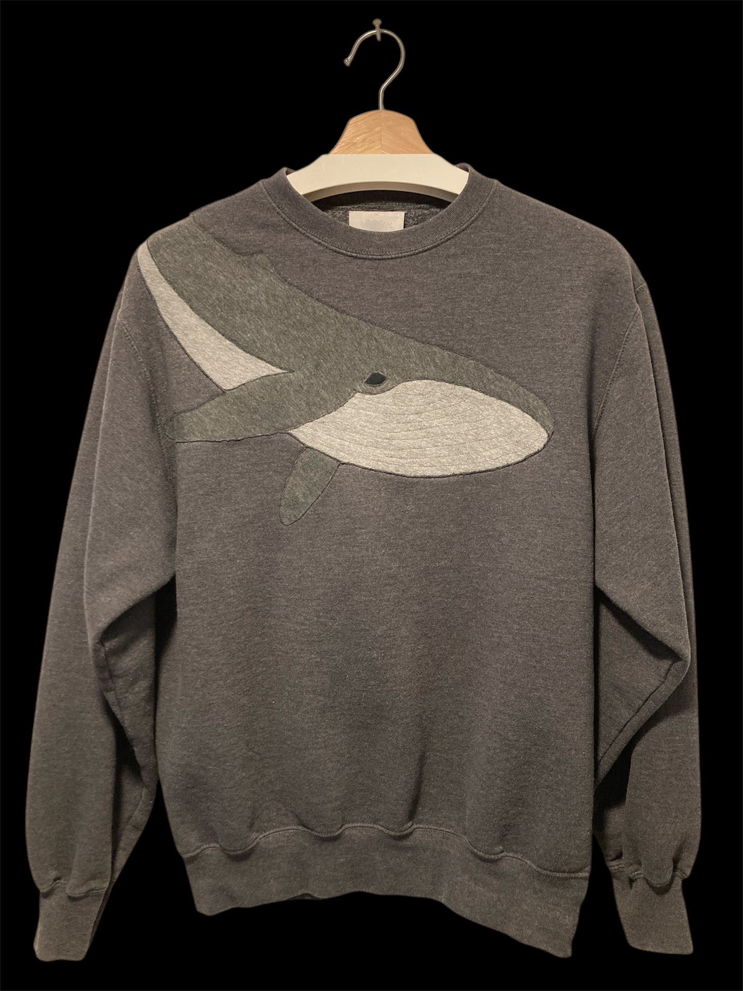 Upcycled whale sweatshirt.