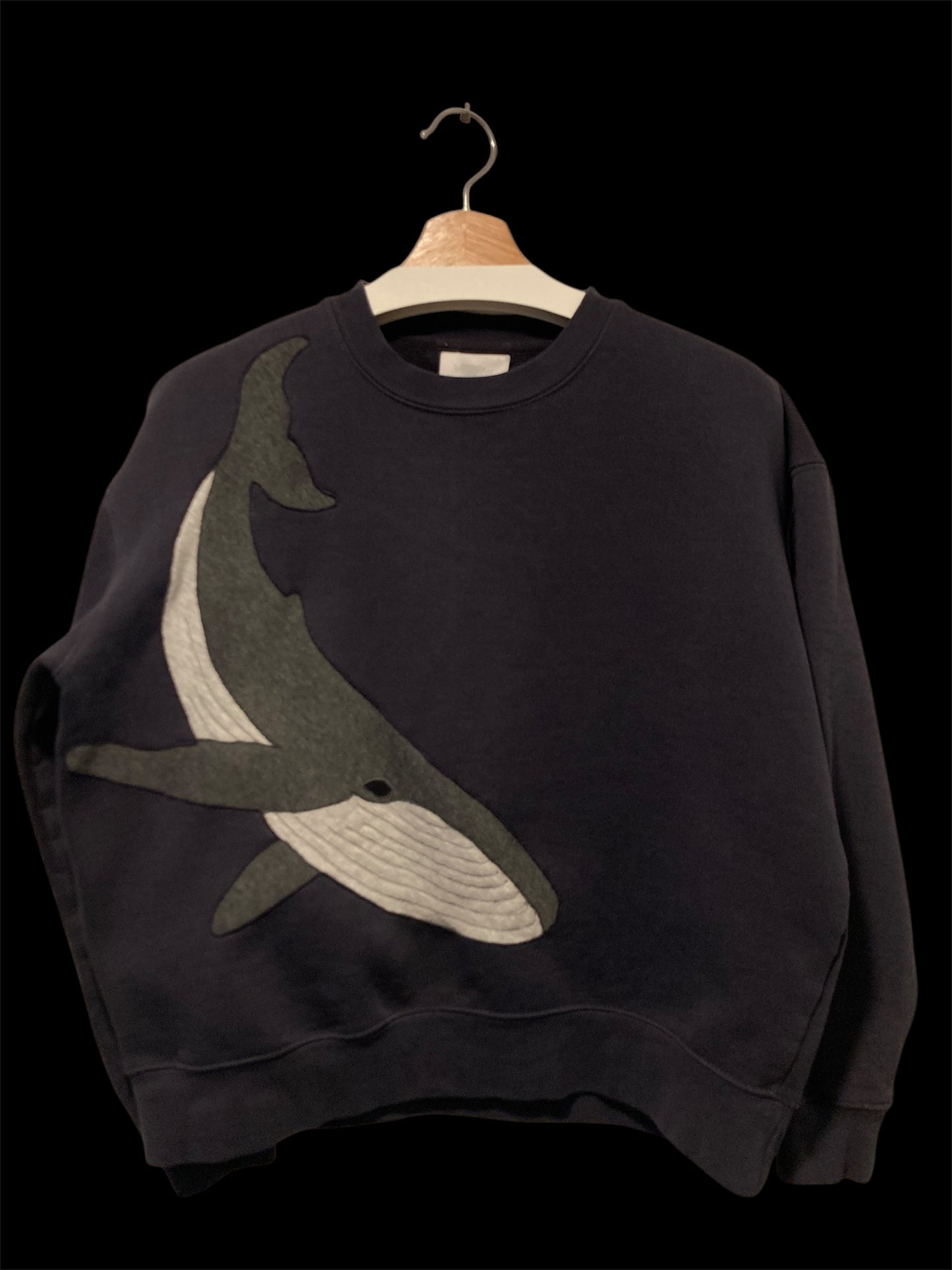 Upcycled whale sweatshirt.