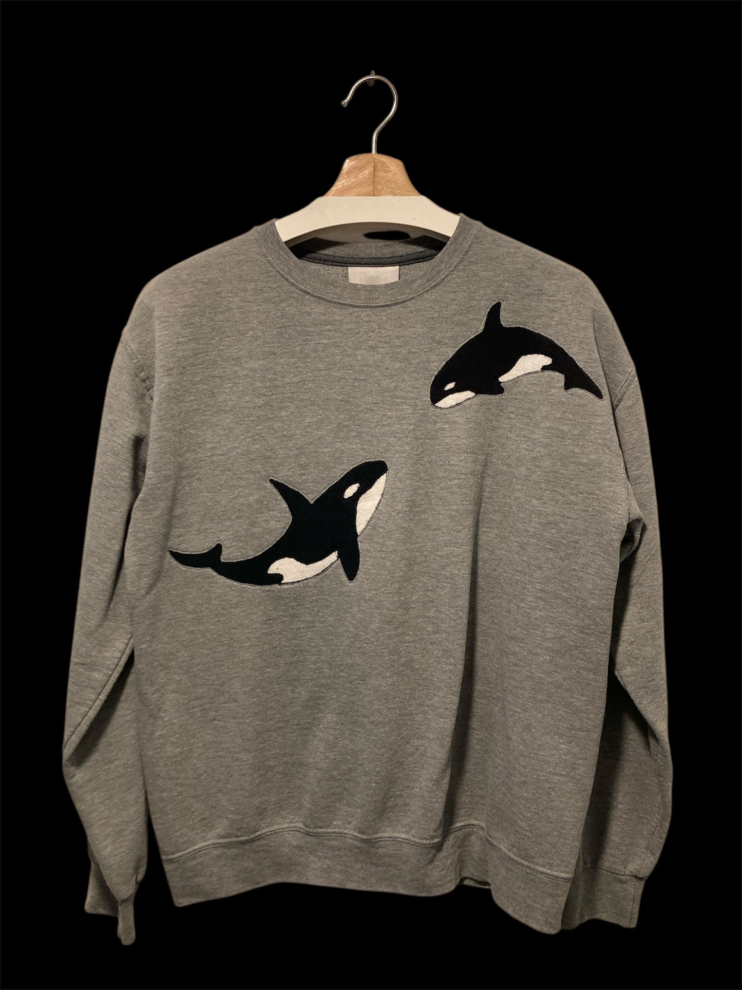 Upcycled Orca sweatshirt.