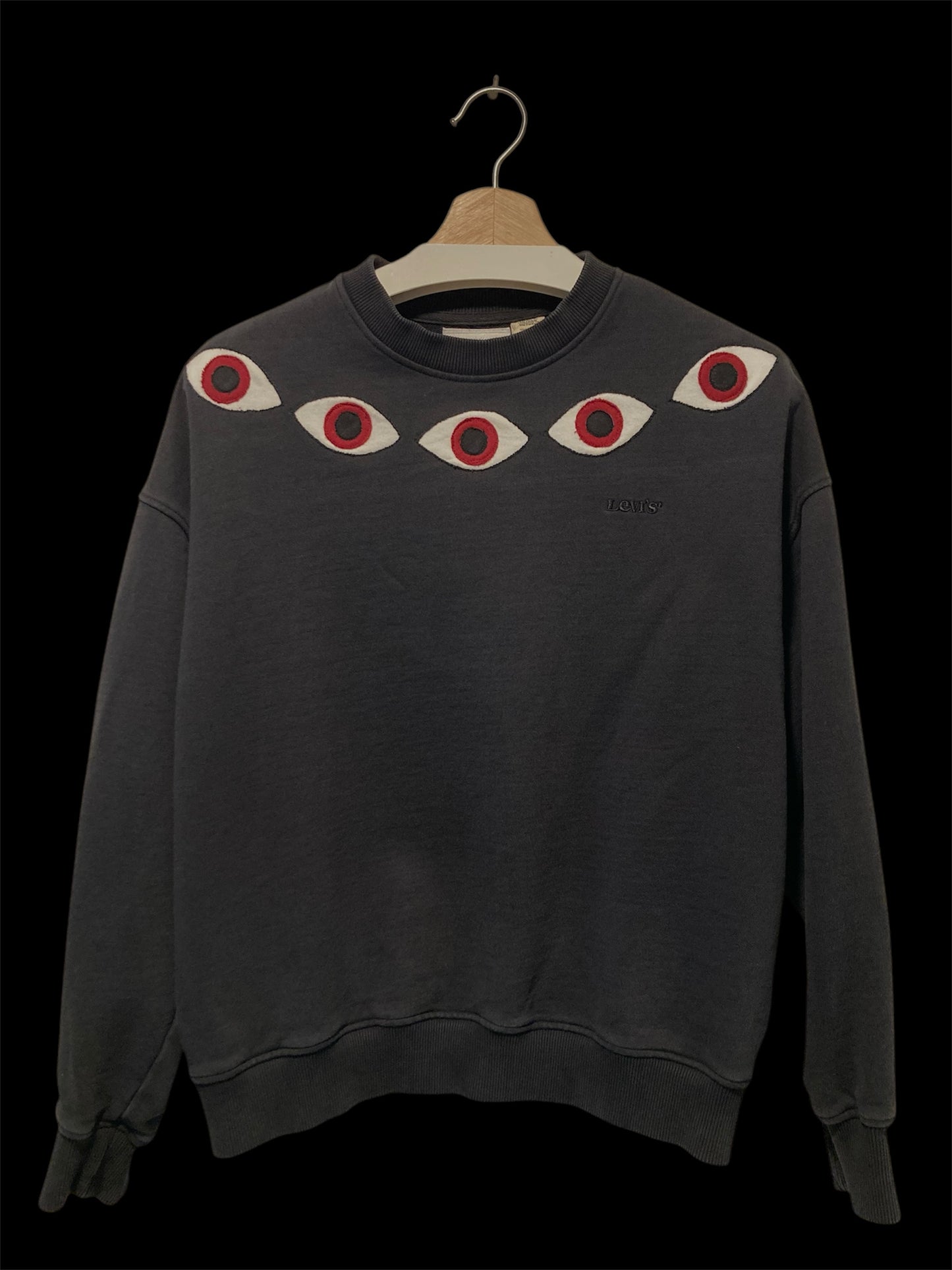 Upcycles eye sweatshirt
